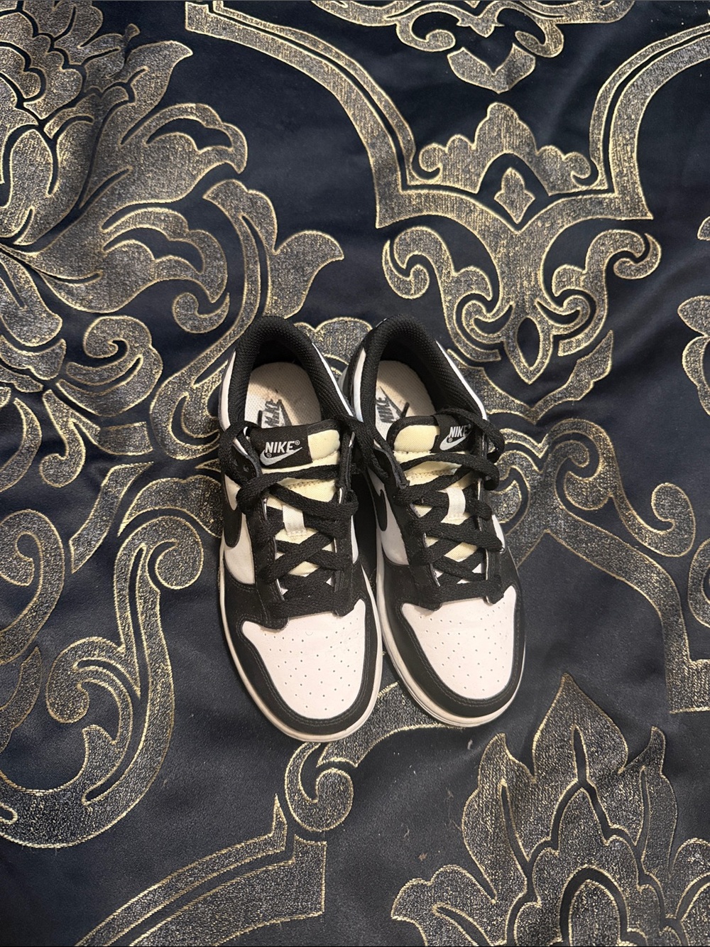 Nike Kids Black and White Low-Top Sneakers with Cream Tongue Accents
